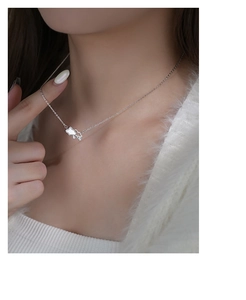 S999 silver necklace with cloud pendant and crystal raindrop on model neck