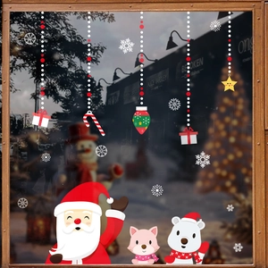 Christmas static window decals featuring Santa, polar bear, and snowflakes on glass
