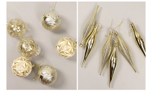Detailed view of gold and champagne Christmas ornaments with glitter and matte finishes