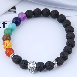Lava rock stone bracelet with chakra beads and a silver skull charm for men and women