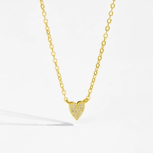 Sparkling S925 silver heart necklace with pave set diamonds on a gold-plated cable chain