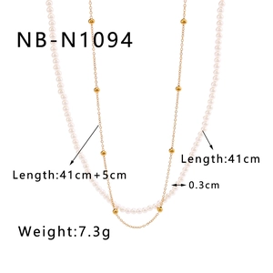 Detail view of double-layer necklace with 41cm pearl chain and gold bead chain specs