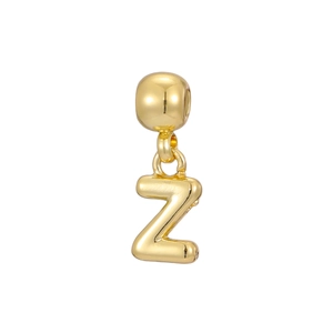 Macro detail of 18k gold plated balloon initial Z pendant with polished mirror finish
