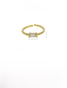 Detail of twisted 18k gold brass ring with 7.5x3.4mm rectangular birthstone and adjustable band