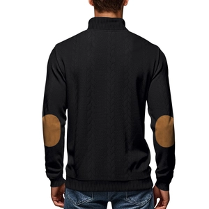 Detail of knitted men cardigan with classic brown elbow patches on the sleeves