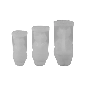 Three translucent silicone bear candle molds in different sizes for DIY craft projects