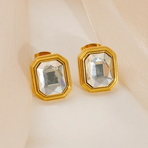 Elegant gold stainless steel earrings with emerald-cut white zircon on champagne satin
