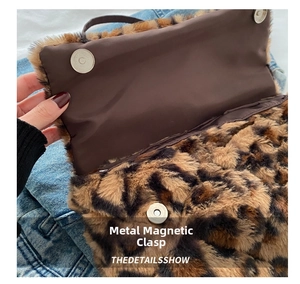 Detail shot of the sturdy magnetic metal clasp and plush leopard faux fur texture