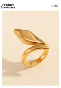 Close-up of polished 18K gold plated snake-shaped adjustable stainless steel ring