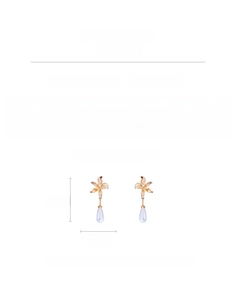 Detailed view of gold flower earrings with drop pearls and silver pins, weighing 8.9g