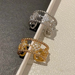 Minimalist double-layer starburst open rings in gold and silver with zircon stones