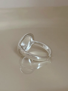 Close-up of S925 sterling silver hallmark on the inner band of the minimalist ring