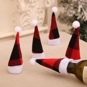 Set of five red and black buffalo plaid Christmas wine bottle hats with white faux fur trim