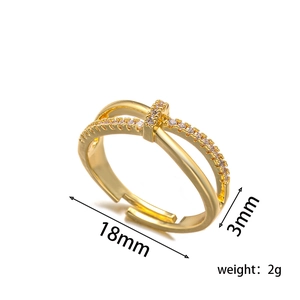 Luxe micro-pave twisted cross open ring in gold with sparkling zircons and dimensions
