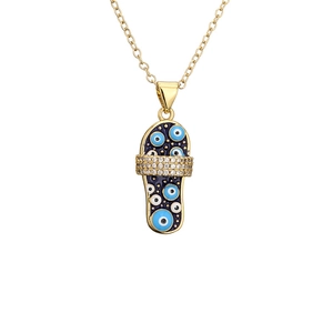 Golden flip-flop necklace with blue evil eye patterns and sparkling cubic zirconia