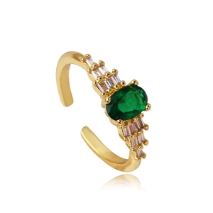 Vintage gold-plated ring featuring an oval emerald-cut zircon with side stone accents