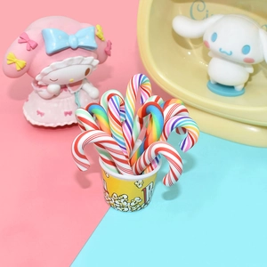 DIY Christmas candy cane resin charms in a popcorn bucket for phone case decoration