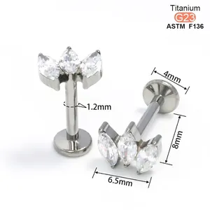 Vue technique montrant les dimensions du stud en titane G23 et les détails zircons