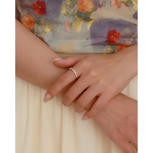 Exquisite S925 sterling silver heart-shaped ring with sparkling crystals on a finger