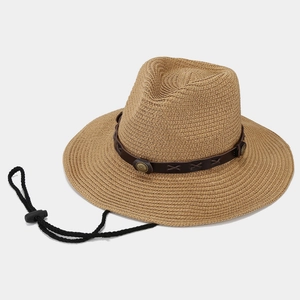 Detail of khaki straw sun hat with leather band, metal studs, and adjustable chin cord
