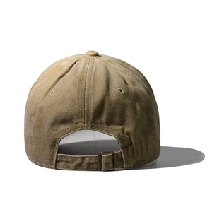 Rear view of washed khaki cotton baseball cap showing adjustable metal buckle strap