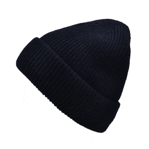 Detailed view of black ribbed knit wool beanie hat providing extra winter warmth
