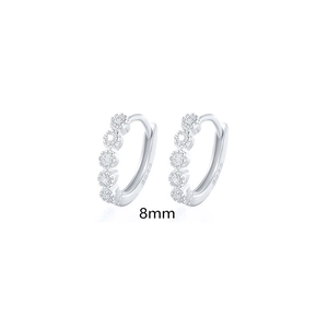 Detail showing 8mm S925 sterling silver hoop earrings with sparkling zircon stones