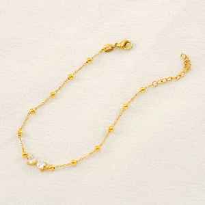 Bracelet élégant en acier inoxydable doré 18 carats avec motif papillon en cœur de zircon