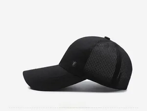 Detail of breathable black mesh baseball cap with side metal shield and F logo engraving
