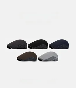 Detail of wool blend flat caps showing five colors and side patchwork textures