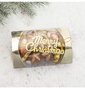 Golden Christmas tree ornaments set with star bell and candy cane in a gift box