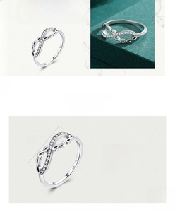 Detail of 925 sterling silver infinity ring with micro-pave cubic zirconia settings
