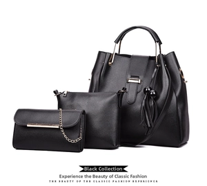 Three-piece black litchi pattern bag set with tassel detail and golden chain wallet