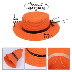 Detail view of foldable straw hat with metallic star rivets and adjustable inner drawstrings