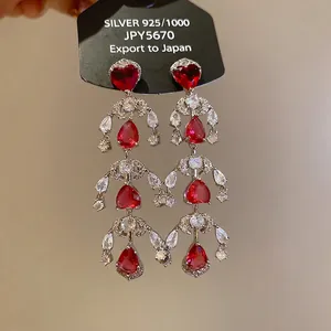 Elegant 925 silver long tassel earrings with red heart stones and sparkling zircon crystals