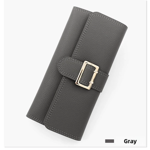 Detail of dark gray PU leather wallet with litchi texture and gold metal buckle