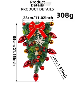 Detailed view of teardrop Christmas wreath with red bows and gold snowflake ornaments