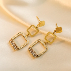 Luxurious gold-plated geometric earrings with zircon inlay on elegant silk fabric