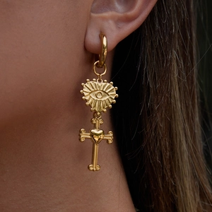18K gold-plated stainless steel hoop earrings with heart-eye cross pendant on model