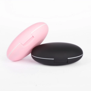 5-piece portable travel makeup brush set in a pink and black matte storage case with mirror