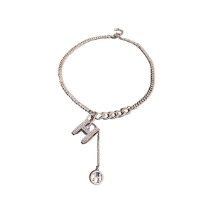 Silver layered necklace featuring dual crystal-encrusted H pendants on a mixed chain