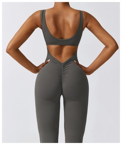 Detailed back view of dark grey scrunch butt yoga bodysuit with cutout design
