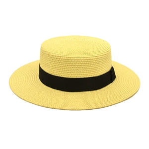 Flat top straw boater hat with black ribbon band and natural weave texture