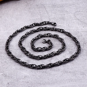 Macro shot of dark grey titanium steel rope chain necklace with sturdy lobster clasp