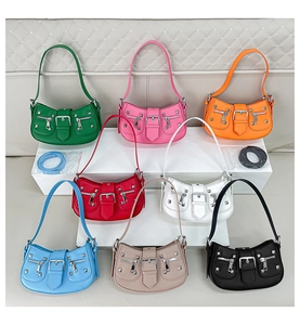 Detailed collection of colorful motorcycle bags with studs and zippers in eight shades