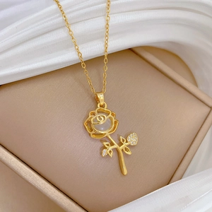 Luxurious gold cat eye stone flower necklace with sparkling crystals in a gift box