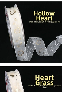 Detail of 2.5cm chiffon ribbon with gold heart stamping for gift wrapping and cake decor
