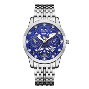 Detailed macro view of the ORUSS skeleton watch face with blue dial and golden hands