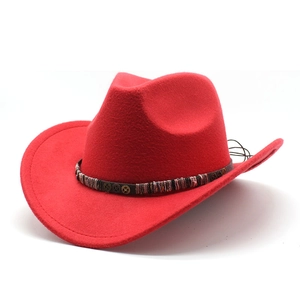 Detail of red cowboy hat featuring steampunk metal gears on leather hatband