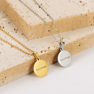 Gold and silver stainless steel necklaces with Merry & Bright engraving on stone